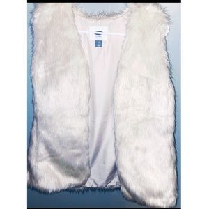 White fur vest